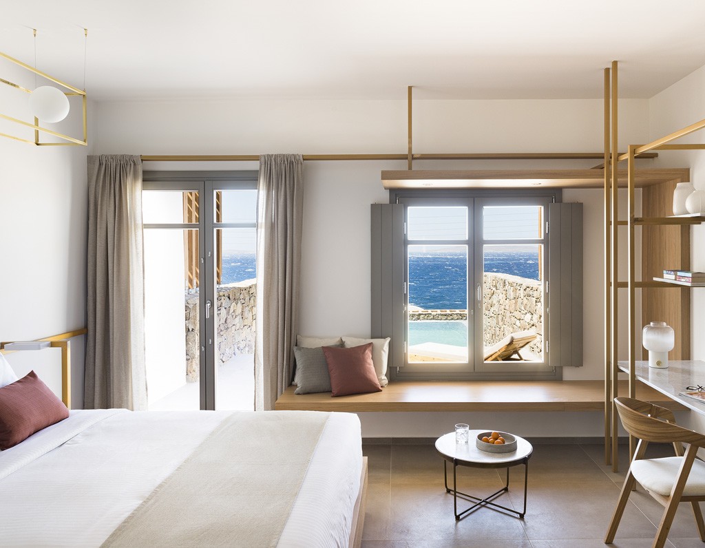 DELUXE POOL SUITE WITH SEA VIEW